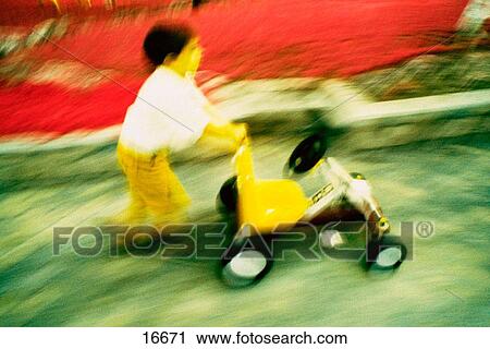 Boy pulling toy car View Large Photo Image Stock Image - Boy pulling toy car. Fotosearch