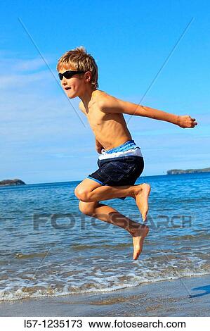 boy running on sandy beach, Sutherland, Scotland View Large Photo Image Stock Image - boy running on sandy beach, Sutherland, Scotland. Fotosearch