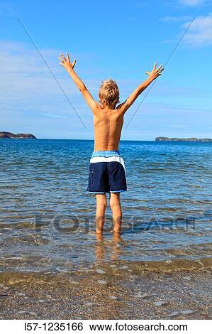 boy running on sandy beach, Sutherland, Scotland View Large Photo Image Stock Photograph - boy running on sandy beach, Sutherland, Scotland. Fotosearch