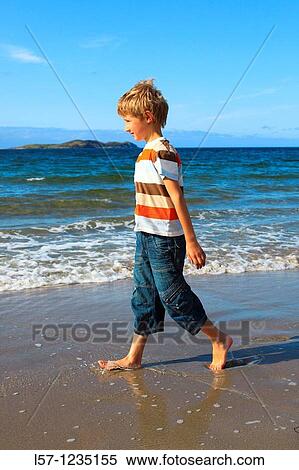 boy running on sandy beach, Sutherland, Scotland View Large Photo Image Stock Photography - boy running on sandy beach, Sutherland, Scotland. Fotosearch