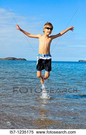 boy running on sandy beach, Sutherland, Scotland View Large Photo Image Stock Photography - boy running on sandy beach, Sutherland, Scotland. Fotosearch