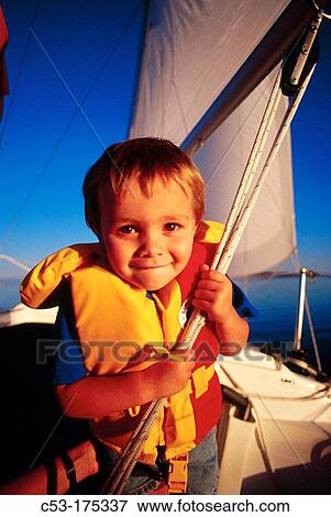 Boy sailing on Great Salt Lake. Utah. USA View Large Photo Image Stock Photo - Boy sailing on Great Salt Lake. Utah. USA. Fotosearch