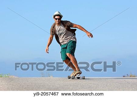 boy skating with hat and sunglasses. View Large Photo Image Stock Photo - boy skating with hat and sunglasses.. Fotosearch