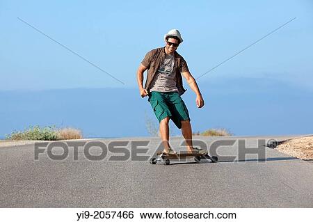 boy skating with hat and sunglasses. View Large Photo Image Stock Photograph - boy skating with hat and sunglasses.. Fotosearch