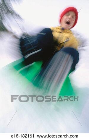 Boy sledding View Large Photo Image Stock Image - Boy sledding. Fotosearch