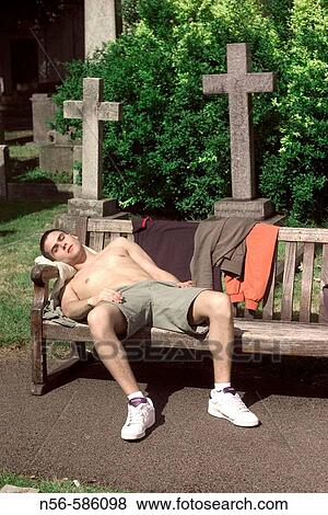 Boy sleeping in cemetery. View Large Photo Image Stock Photo - Boy sleeping in cemetery.. Fotosearch