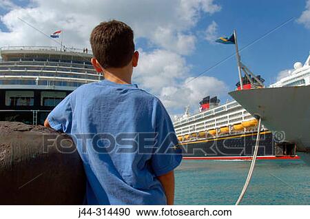 Boy standing at Seaport, Bahamas View Large Photo Image Stock Image - Boy standing at Seaport, Bahamas. Fotosearch