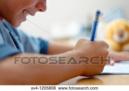 Boy studing at home View Large Photo Image Stock Photo - Boy studing at home. Fotosearch