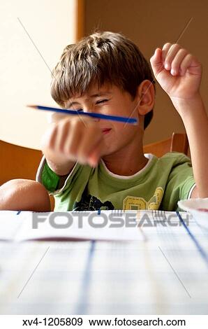 Boy studing at home View Large Photo Image Stock Photo - Boy studing at home. Fotosearch