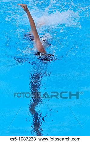 Stock Image - boy swimming. Fotosearch