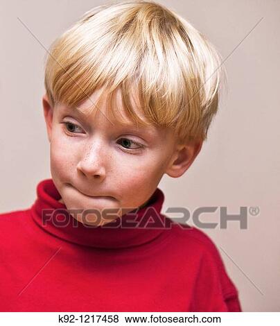 Stock Photo - Boy thinking. Fotosearch