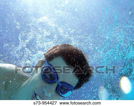 Stock Photo - Boy underwater. Fotosearch