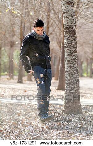 boy walking in the park View Large Photo Image Stock Image - boy walking in the park. Fotosearch