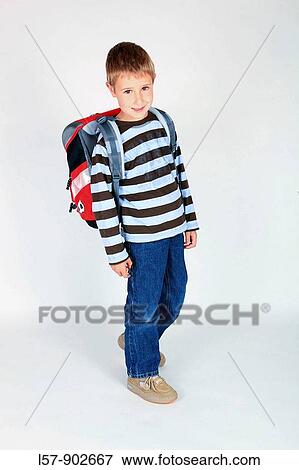 boy walking with satchel, white background, Studio, Switzerland View Large Photo Image Stock Photo - boy walking with satchel, white background, Studio, Switzerland. Fotosearch