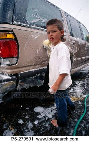Boy washing car for fund raising for little league View Large Photo Image Stock Image - Boy washing car for fund raising for little league. Fotosearch