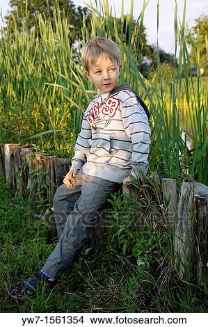 Picture - Boy watching carefully. Fotosearch