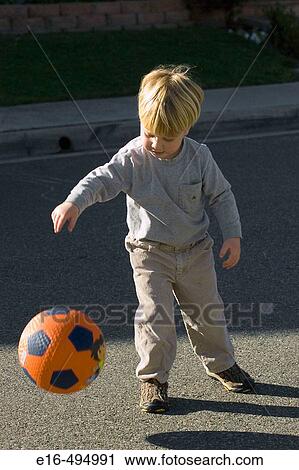 Boy with ball View Large Photo Image Stock Image - Boy with ball. Fotosearch