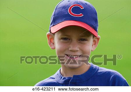 Boy with baseball uniform View Large Photo Image Stock Image - Boy with baseball uniform. Fotosearch