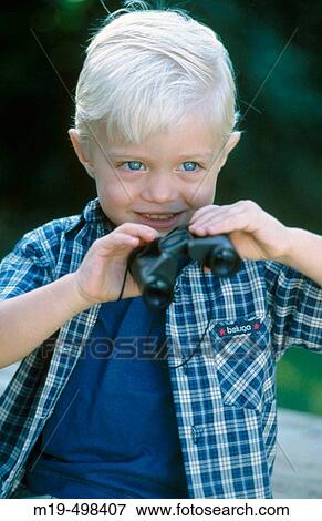 Stock Photo - boy with binoculars. Fotosearch