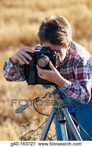 Boy with camera View Large Photo Image Stock Photo - Boy with camera. Fotosearch