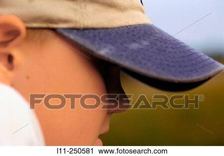 Boy with cap View Large Photo Image Stock Image - Boy with cap. Fotosearch