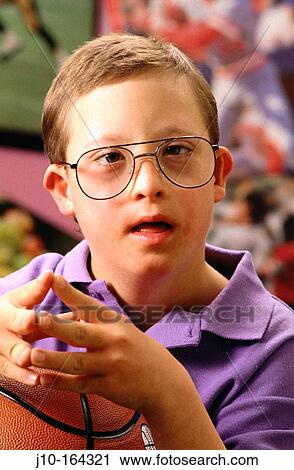 Boy with Down Syndrome disease, Boston, MA View Large Photo Image Stock Image - Boy with Down Syndrome disease, Boston, MA. Fotosearch