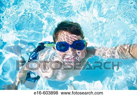 Boy with goggles underwater View Large Photo Image Stock Photo - Boy with goggles underwater. Fotosearch
