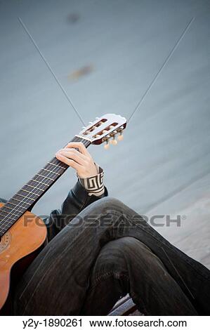 Boy with guitar in the street View Large Photo Image Stock Image - Boy with guitar in the street. Fotosearch