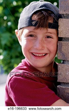 Boy with hat View Large Photo Image Stock Image - Boy with hat. Fotosearch