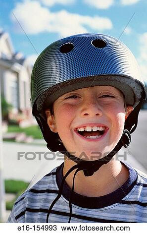 Stock Image - Boy with helmet. Fotosearch