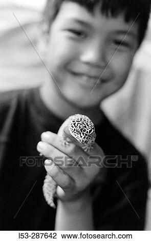 Boy with lizard View Large Photo Image Stock Image - Boy with lizard. Fotosearch