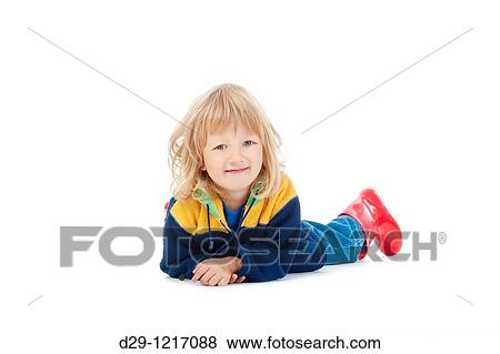 boy with long blond hair lying on the floor - isolated on white View Large Photo Image Stock Photo - boy with long blond hair lying on the floor - isolated on white. Fotosearch