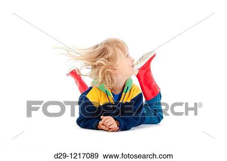 boy with long blond hair lying on the floor - isolated on white View Large Photo Image Stock Photo - boy with long blond hair lying on the floor - isolated on white. Fotosearch
