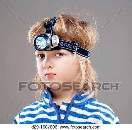 boy with long blond hair playing with flashlight View Large Photo Image Stock Photograph - boy with long blond hair playing with flashlight. Fotosearch
