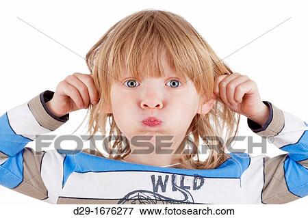 boy with long blond hair pulling his ears, looking - isolated on white View Large Photo Image Stock Photo - boy with long blond hair pulling his ears, looking - isolated on white. Fotosearch