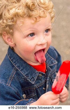 Boy with popsicle View Large Photo Image Stock Photo - Boy with popsicle. Fotosearch