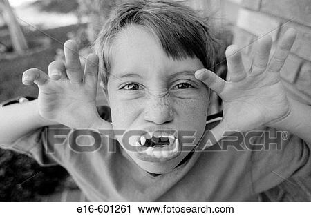 Boy with pretend monster teeth View Large Photo Image Stock Image - Boy with pretend monster teeth. Fotosearch