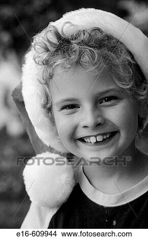 Boy with Santa hat View Large Photo Image Picture - Boy with Santa hat. Fotosearch