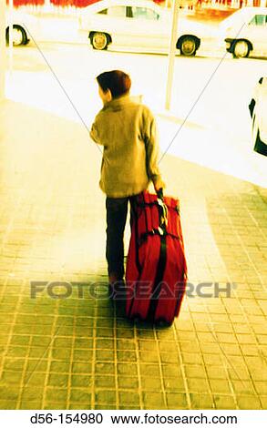 Boy with suitcase View Large Photo Image Stock Image - Boy with suitcase. Fotosearch