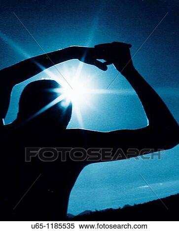 Boy with sun in his arms View Large Photo Image Stock Photography - Boy with sun in his arms. Fotosearch