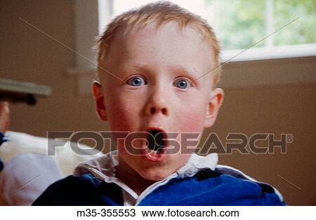 Boy with surprised face View Large Photo Image Stock Image - Boy with surprised face. Fotosearch