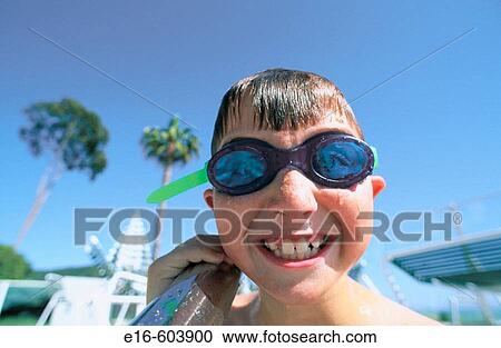 Boy with swimming goggles View Large Photo Image Stock Image - Boy with swimming goggles. Fotosearch