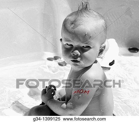 Stock Photography - Boy with the Mom Tattoo. Fotosearch