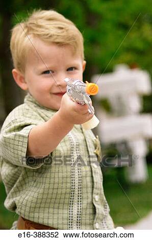 boy with toy gun View Large Photo Image Stock Image - boy with toy gun. Fotosearch