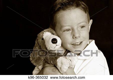 Boy with velvet dog View Large Photo Image Stock Image - Boy with velvet dog. Fotosearch