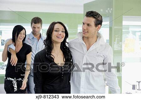 Boyfriends who watch jewelry showcase. View Large Photo Image Stock Image - Boyfriends who watch jewelry showcase.. Fotosearch