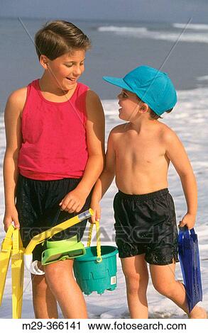Boys at beach. View Large Photo Image Stock Image - Boys at beach.. Fotosearch