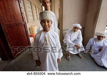 Picture - Boys at the market, Nizwa, Oman. Fotosearch
