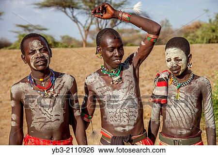 Boys From The Hamer Tribe Outside Their Village, Near Turmi, Omo Valley, Ethiopia. View Large Photo Image Stock Photograph - Boys From The Hamer Tribe Outside Their Village, Near Turmi, Omo Valley, Ethiopia.. Fotosearch