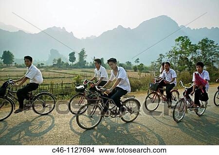 Picture - Boys going to the school. Vang Vieng. Laos.. Fotosearch